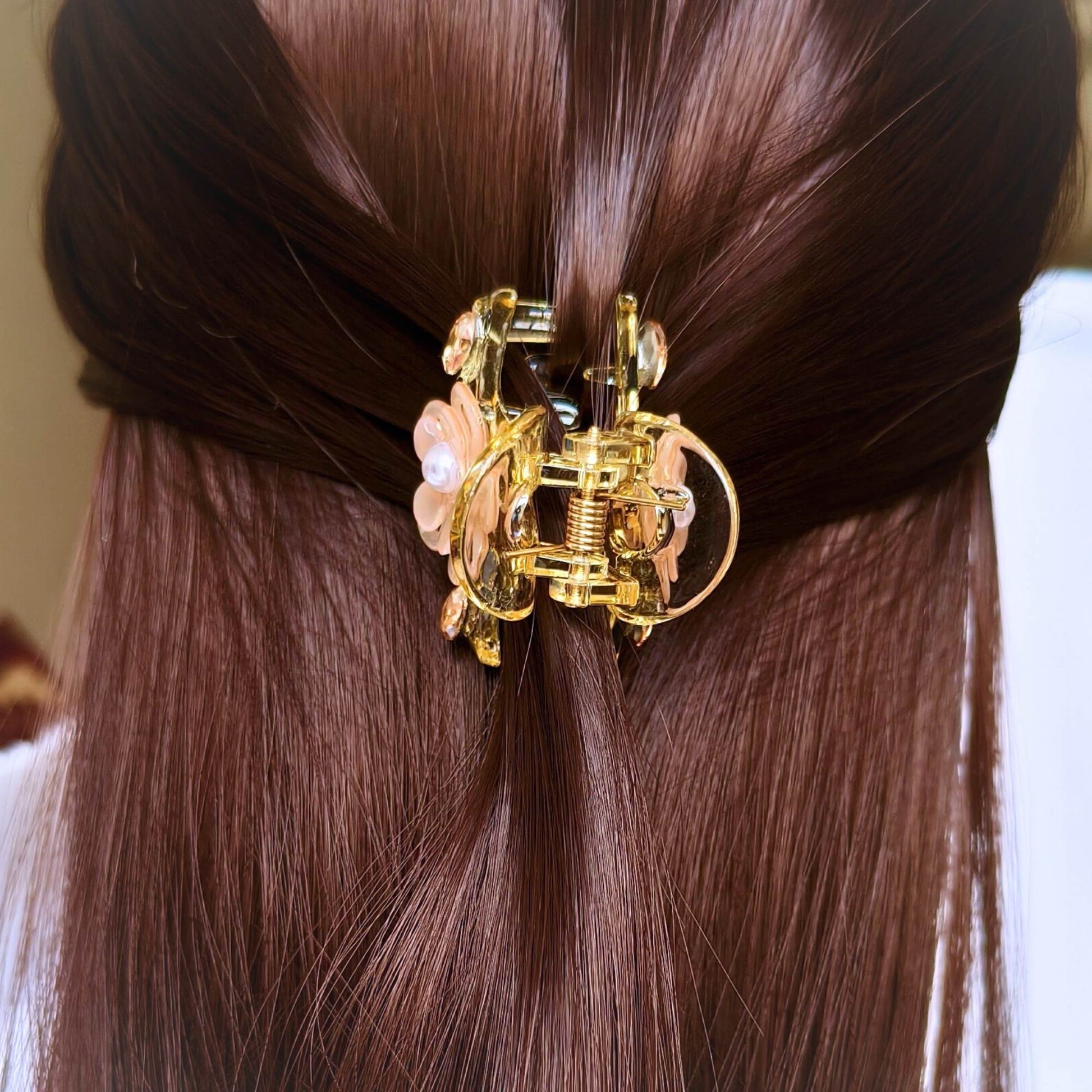 Decorative hair clip on a person's hair with a blurred background